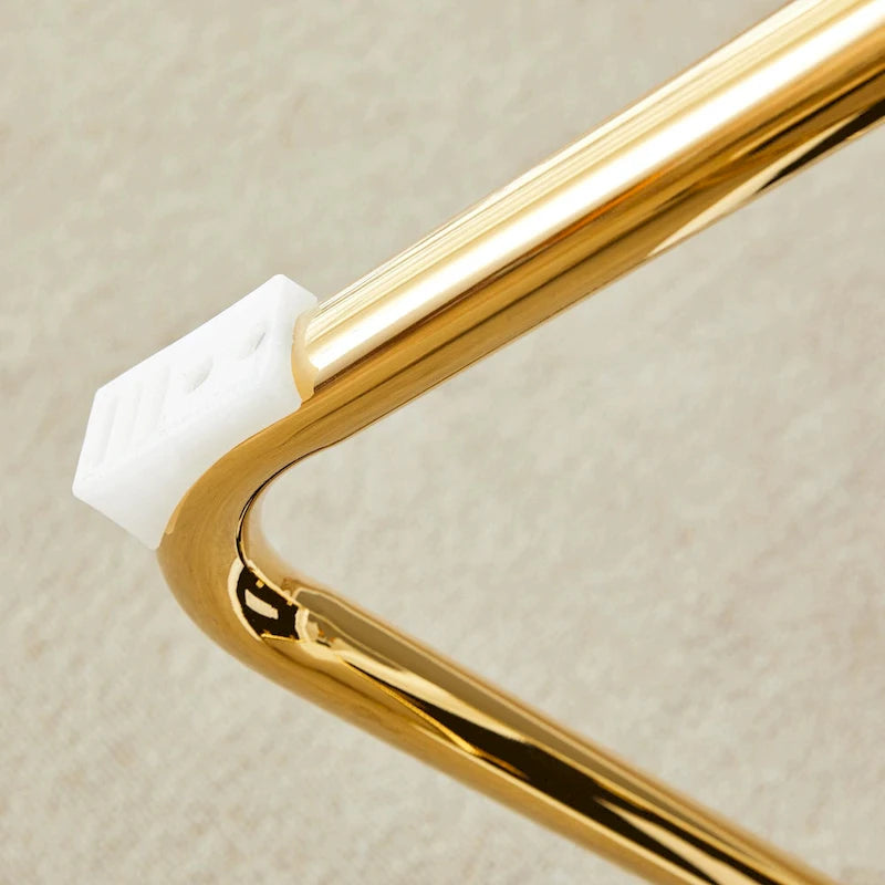 Moderner Esszimmerstuhl aus PU-Leder mit goldfarbenen Metallbeinen, ergonomisch gepolsterte Rückenlehne