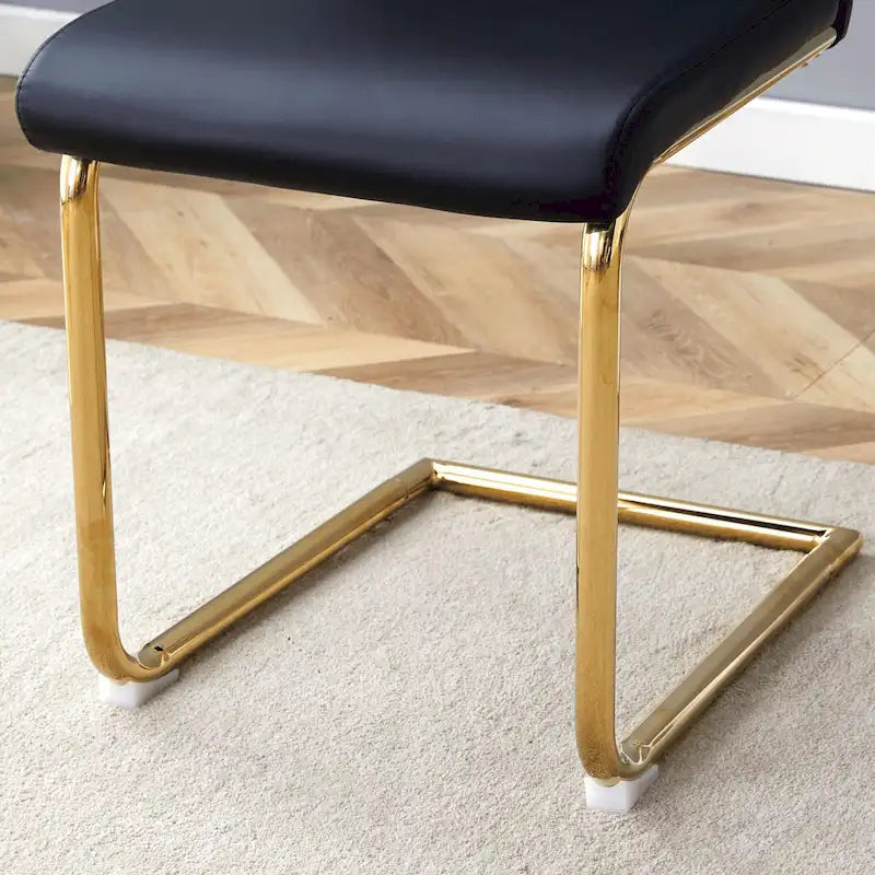 Moderner Esszimmerstuhl aus PU-Leder mit goldfarbenen Metallbeinen, ergonomisch gepolsterte Rückenlehne