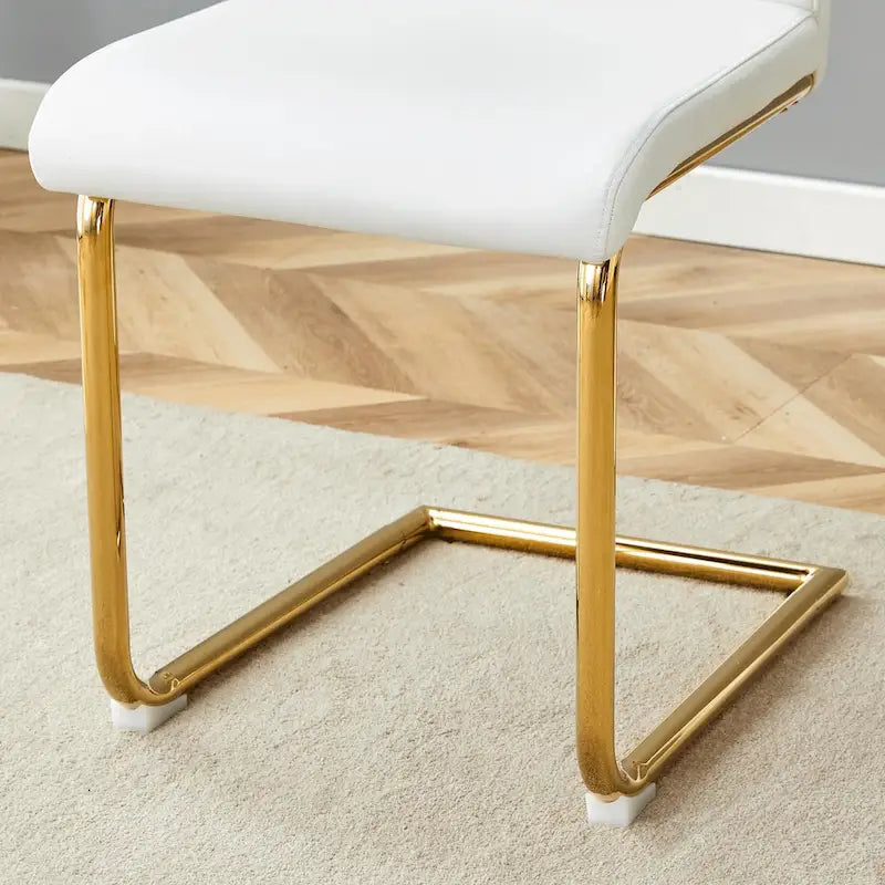 Moderner Esszimmerstuhl aus PU-Leder mit goldfarbenen Metallbeinen, ergonomisch gepolsterte Rückenlehne